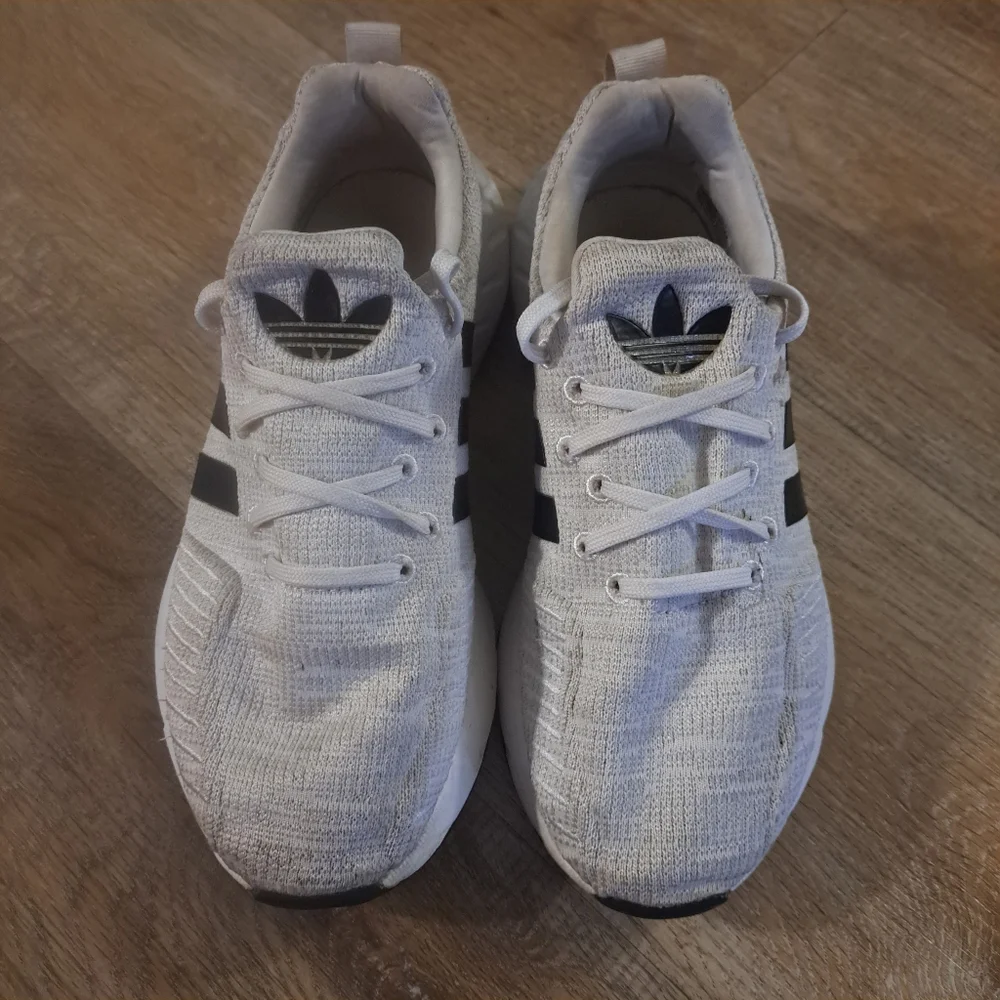 Adidas Kids' White Athletic Sneakers with Black Stripes